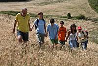 Cascina Rossago (Pv) comunità agricola per giovani persone autistiche diretta da Stefania Uccelli di Nemi. Nella foto la dott.ssa Elena Croci accompagni un gruppo di giovani per una passeggiata . Foto Gianluca Moggi/ Sestini